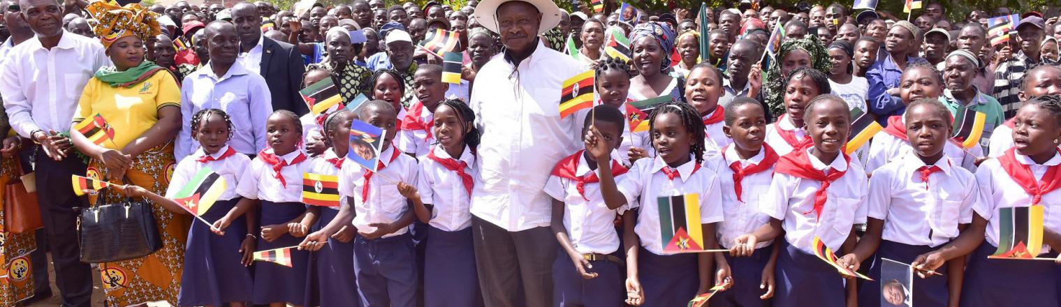 The People of Pemba cheering and waving to President Museveni as he makes his way to the podium to address them. PPU PHOTO 